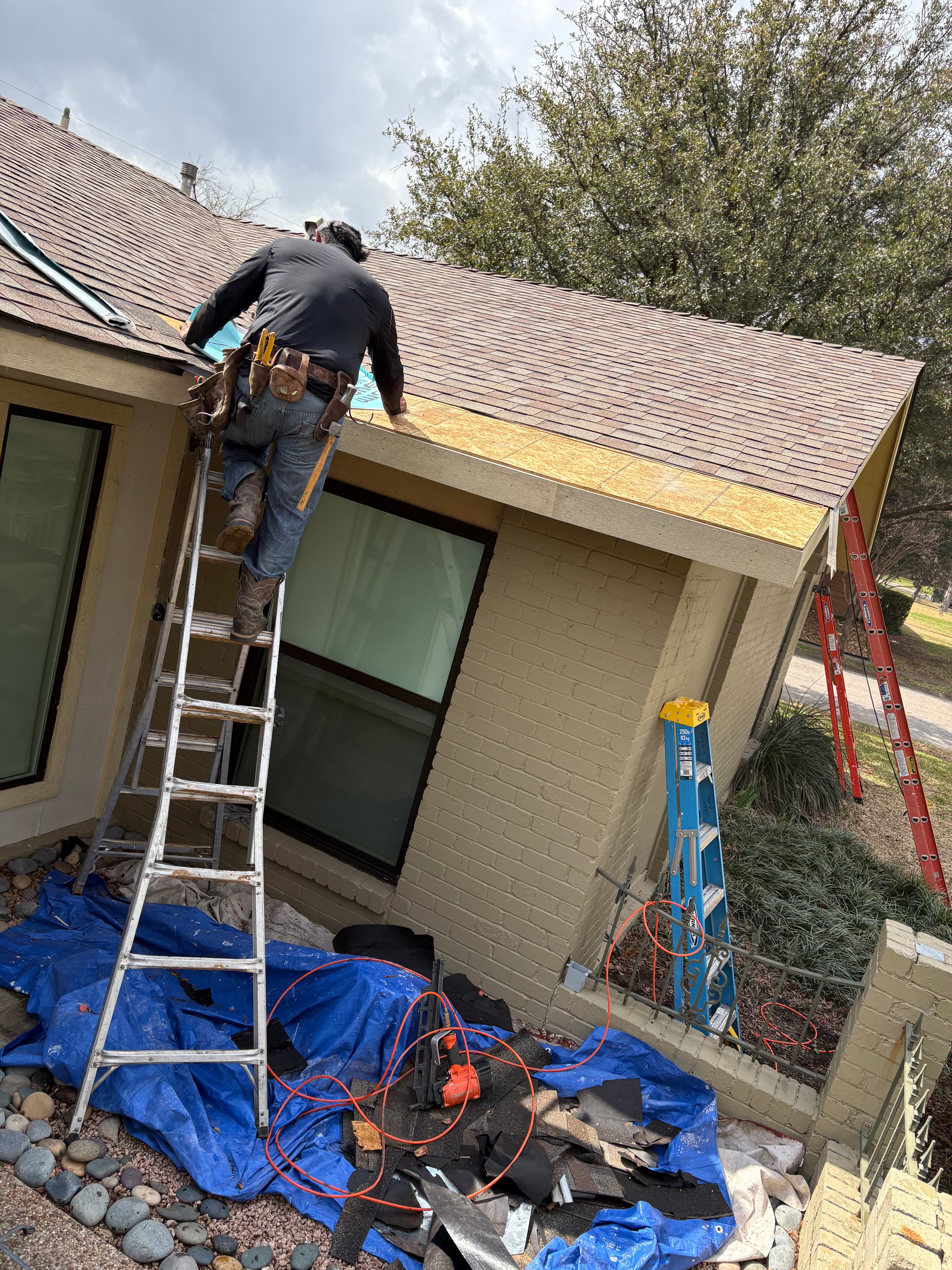 Before photo of roofline damage before Dallas exterior repair.
