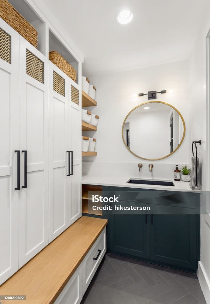 Beautiful mudroom renovation with custom storage